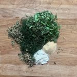 ranch seasoning ingredients on a wooden surface