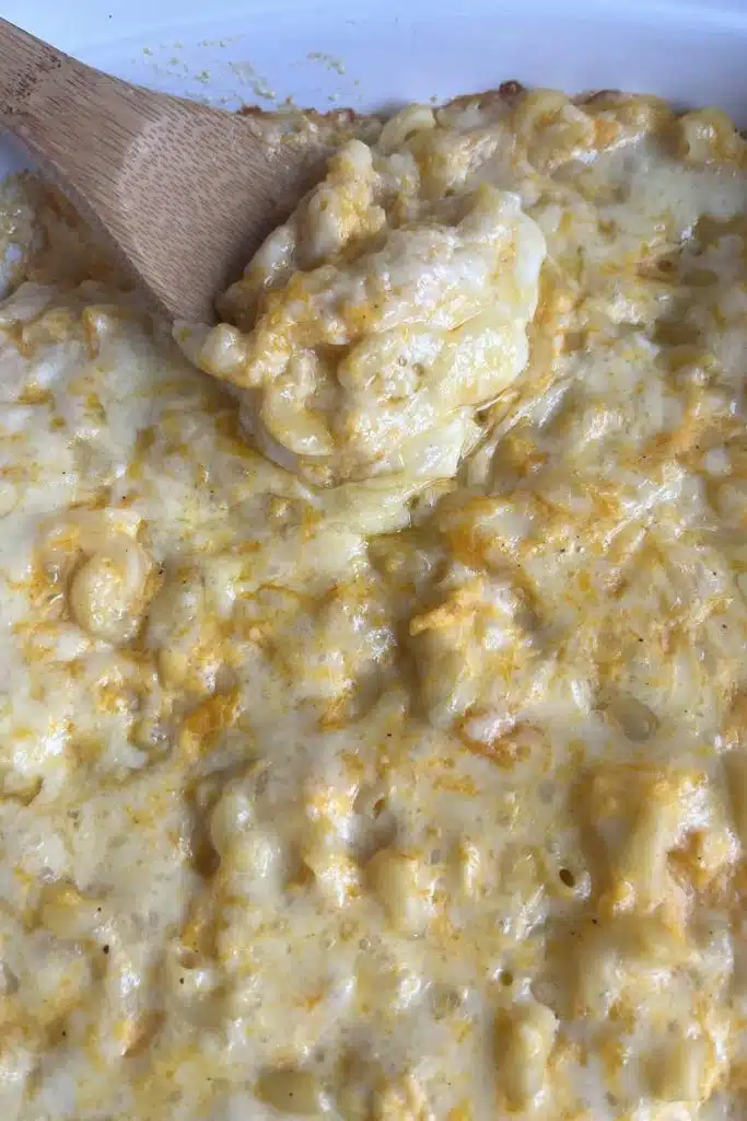 butternut squash mac and cheese with wooden spoon