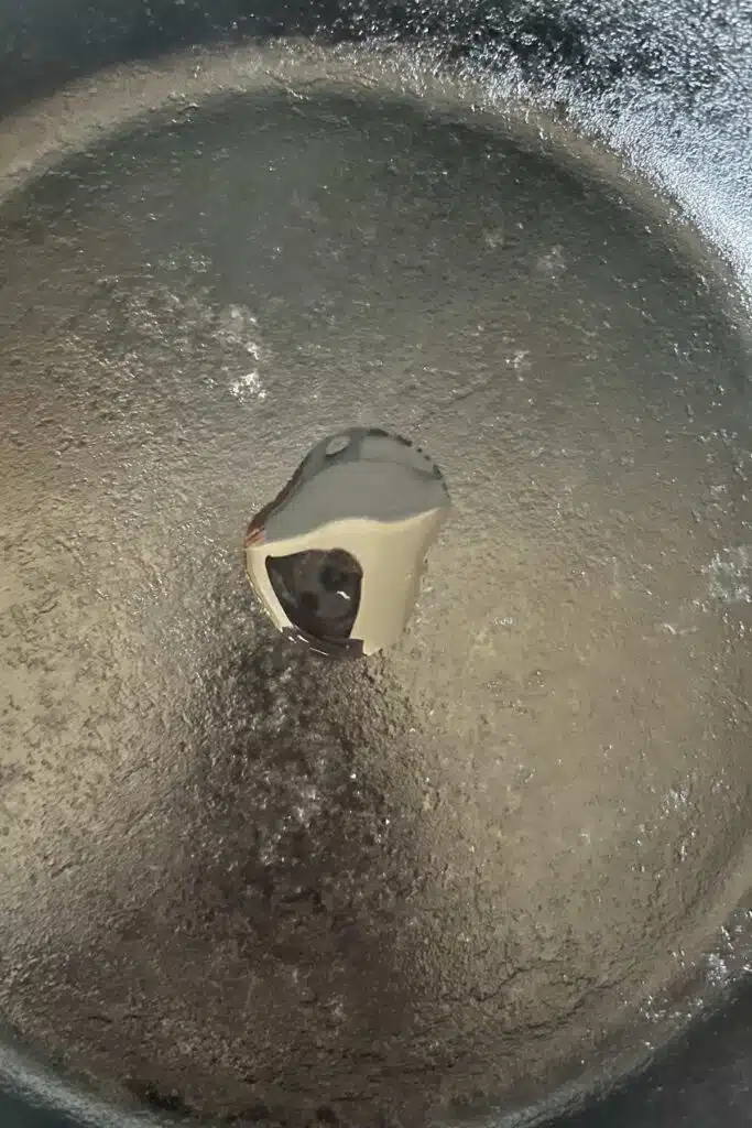 cast iron pan with small dribble of oil